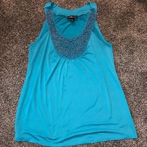 Blue sleeveless IZ Beyer top